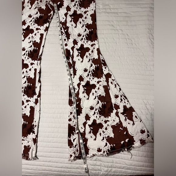 Saints and Hearts Cowprint Bell Bottom Jeans! - Picture 9 of 13